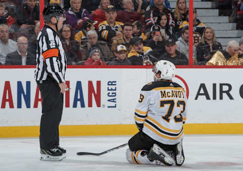 OTTAWA, ON – DECEMBER 9: Charlie McAvoy #73 of the Boston Bruins waits for a penalty call from referee Dan O’Halloran during an NHL game against the Ottawa Senators at Canadian Tire Centre on December 9, 2019 in Ottawa, Ontario, Canada. (Photo by Andre Ringuette/NHLI via Getty Images)