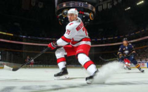 BUFFALO, NY – NOVEMBER 14: Nino Niederreiter #21 of the Carolina Hurricanes skates for the puck against the Buffalo Sabres during an NHL game on November 14, 2019 at KeyBank Center in Buffalo, New York. (Photo by Bill Wippert/NHLI via Getty Images)