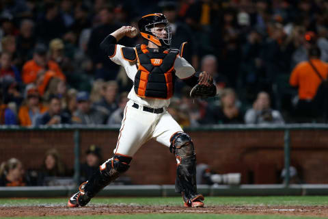 SAN FRANCISCO, CA – AUGUST 09: Catcher Buster Posey #28 of the San Francisco Giants warms up at the top of the sixth inning against the Pittsburgh Pirates at AT&T Park on August 9, 2018 in San Francisco, California. (Photo by Lachlan Cunningham/Getty Images)