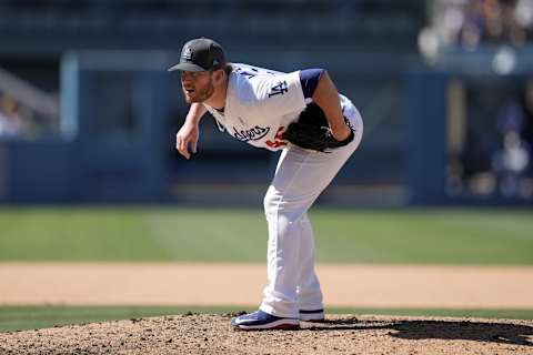 Jun 19, 2022; Los Angeles, California, USA; Los Angeles Dodgers relief pitcher Craig Kimbrel (46) prepares to deliver a pitch in the ninth inning against the Cleveland Guardians at Dodger Stadium. Mandatory Credit: Kirby Lee-USA TODAY Sports