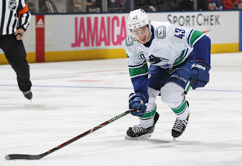 Quinn Hughes #43 of the Vancouver Canucks skates against the Maple Leafs. Photo by Claus Andersen/Getty Images)