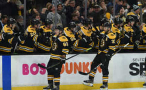 BOSTON, MA – MARCH 2: Brad Marchand #63 and Patrice Bergeron #37 of the Boston Bruins celebrate their goal against the New Jersey Devils at the TD Garden on March 2, 2019 in Boston, Massachusetts. (Photo by Steve Babineau/NHLI via Getty Images)