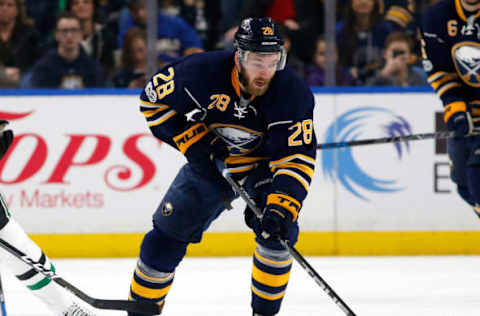 Jan 16, 2017; Buffalo, NY, USA; Buffalo Sabres center Zemgus Girgensons (28) passes the puck during the second period against the Dallas Stars at KeyBank Center. Mandatory Credit: Kevin Hoffman-USA TODAY Sports