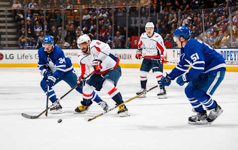 TORONTO, ON – FEBRUARY 21: Alex Ovechkin #8 of the Washington Capitals battles with Auston Matthews #34 and Jake Gardiner #51 of the Toronto Maple Leafs during the second period at the Scotiabank Arena on February 21, 2019 in Toronto, Ontario, Canada. (Photo by Mark Blinch/NHLI via Getty Images)