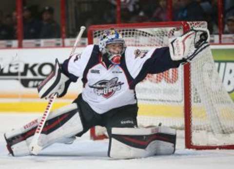 Windsor Spitfires goaltender Michael DiPietro reaches to make a second period save during Ontario Hockey League action against Saginaw at the WFCU Centre on October 1, 2015.Photo Coutesy: JASON KRYK/The Windsor Star)