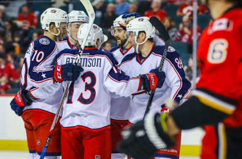 Dec 16, 2016; Calgary, Alberta, CAN; Columbus Blue Jackets defenseman Zach Werenski (8) celebrates his goal with teammates against the Calgary Flames during the second period at Scotiabank Saddledome. Mandatory Credit: Sergei Belski-USA TODAY Sports