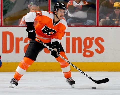 Michael Del Zotto controlling the puck as a Flyers player. (Photo by Elsa/Getty Images)