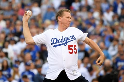 LOS ANGELES, CA – OCTOBER 28: Former Los Angeles Dodgers player Orel Hershiser throws the ceremonial first pitch prior to Game Five of the 2018 World Series at Dodger Stadium on October 28, 2018 in Los Angeles, California. (Photo by Harry How/Getty Images)