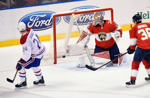 Dec 29, 2016; Sunrise, FL, USA; Montreal Canadiens left wing Phillip Danault (24) scores the winning goal past Florida Panthers goalie James Reimer (34) in overtime at BB&T Center. Montreal Canadiens won 3-2. Mandatory Credit: Steve Mitchell-USA TODAY Sports