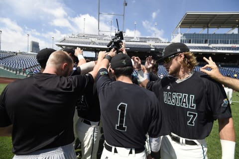 30 JUN 2016: The Coastal Carolina Chanticleers warm up before taking on University of Arizona during Game 3 of the 2016 NCAA Men’s College World Series held at TD Ameritrade Park in Omaha, NE. Jamie Schwaberow/NCAA Photos via Getty Images