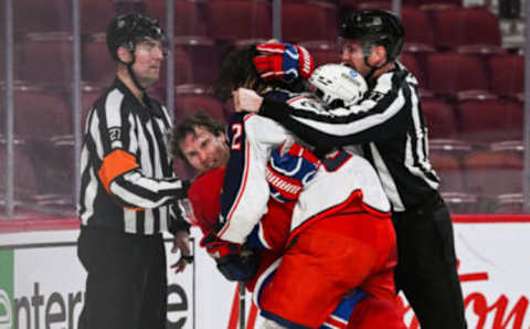 Jan 30, 2022; Montreal, Quebec, CAN; Fight between Montreal Canadiens right wing Brendan Gallagher (11) and Columbus Blue Jackets defenceman Andrew Peeke (2) during the second period at Bell Centre. Mandatory Credit: David Kirouac-USA TODAY Sports