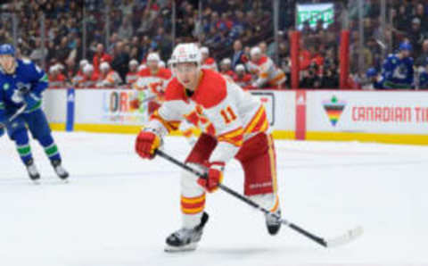 VANCOUVER, CANADA – MARCH 31: Mikael Backlund #11 of the Calgary Flames skates up ice during the third period of their NHL game against the Vancouver Canucks at Rogers Arena on March 31, 2023 in Vancouver, British Columbia, Canada. (Photo by Derek Cain/Getty Images)