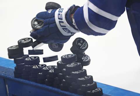 Toronto Maple Leafs tower of pucks (Photo by Claus Andersen/Getty Images)