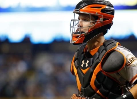 Jun 17, 2016; St. Petersburg, FL, USA; San Francisco Giants catcher Buster Posey (28) looks on against the Tampa Bay Rays at Tropicana Field. Mandatory Credit: Kim Klement-USA TODAY Sports