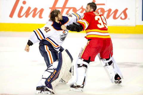 Mike Smith (41), Edmonton Oilers and Cam Talbot (39), Calgary Flames (Photo by Gerry Thomas/NHLI via Getty Images