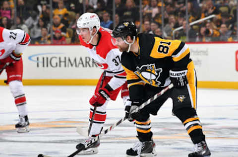 PITTSBURGH, PA – MARCH 31: Andrei Svechnikov #37 of the Carolina Hurricanes skates alongside Phil Kessel #81 of the Pittsburgh Penguins at PPG Paints Arena on March 31, 2019 in Pittsburgh, Pennsylvania. (Photo by Joe Sargent/NHLI via Getty Images)