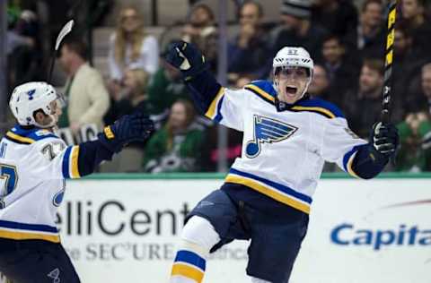 NHL Power Rankings: St. Louis Blues left wing David Perron (57) and defenseman Brad Hunt (77) celebrate Perron