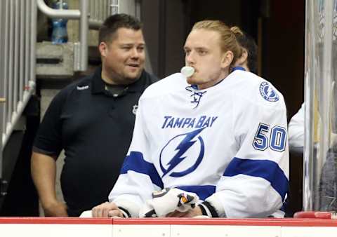 May 13, 2016; Pittsburgh, PA, USA; Tampa Bay Lightning goalie Kristers Gudlevskis (50) sits on the bench after goalie Ben Bishop (not pictured) left the game with an injury against the Pittsburgh Penguins in game one of the Eastern Conference Final of the 2016 Stanley Cup Playoffs at the CONSOL Energy Center. Tampa Bay won 3-1. Mandatory Credit: Charles LeClaire-USA TODAY Sports