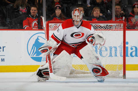 NEWARK, NJ – MARCH 01: Eddie Lack #31 of the Carolina Hurricanes plays against the New Jersey Devils at the Prudential Center on March 1, 2016 in Newark, New Jersey. The Hurricanes defeated the Devils 3-1. (Photo by Bruce Bennett/Getty Images)