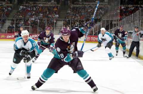 SAN DIEGO: Niclas Havelid #28 of the Anaheim Mighty Ducks takes a slap shot against the San Jose Sharks during the 2nd period on December 21, 2003. (Photo by Donald Miralle/Getty Images)