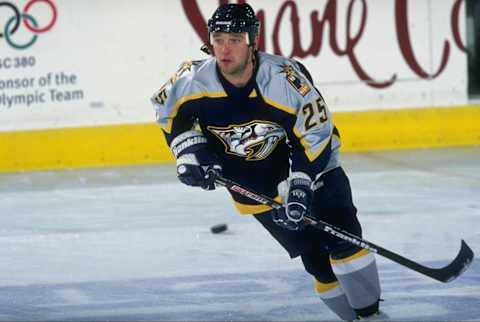 27 Feb 1999: Sergei Krivokrasov #25 of the Nashville Predators skates during the game against the Colorado Avalanche at the McNichols Arena in Denver, Colorado. The Avalanche defeated the Predators 3-1.