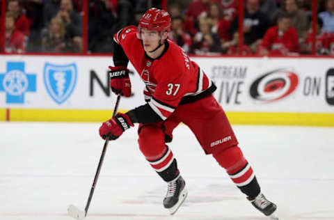 RALEIGH, NC – APRIL 4: Andrei Svechnikov #37 of the Carolina Hurricanes looks to pass the puck against the New Jersey Devils during an NHL game at PNC Arena on April 4, 2019, in Raleigh, North Carolina. (Photo by Gregg Forwerck/NHLI via Getty Images)