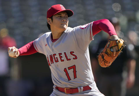 OAKLAND, CALIFORNIA – OCTOBER 05: Shohei Ohtani #17 of the Los Angeles Angels pitches against the Oakland Athletics in the bottom of the first inning at RingCentral Coliseum on October 05, 2022 in Oakland, California. (Photo by Thearon W. Henderson/Getty Images)