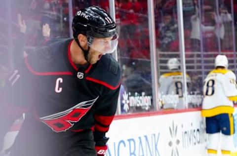 Mar 9, 2021; Raleigh, North Carolina, USA; Carolina Hurricanes center Jordan Staal (11) celebrates his overtime goal against the Nashville Predators at PNC Arena. Mandatory Credit: James Guillory-USA TODAY Sports