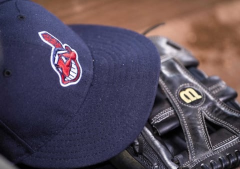 May 16, 2015; Arlington, TX, USA; A view of a Cleveland Indians baseball hat and glove during the game between the Texas Rangers and the Indians at Globe Life Park in Arlington. The Indians defeated the Rangers 10-8. Mandatory Credit: Jerome Miron-USA TODAY Sports