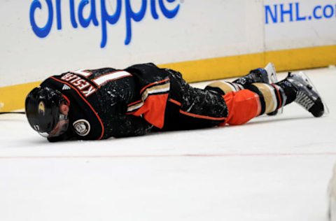 ANAHEIM, CA: Ryan Kesler #17 of the Anaheim Ducks reacts after being hit with a high stick during the third period of a game against the Calgary Flames on December 29, 2017. (Photo by Sean M. Haffey/Getty Images)