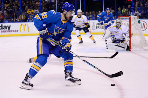 Apr 2, 2017; St. Louis, MO, USA; St. Louis Blues left wing Zach Sanford (82) handles the puck against the Nashville Predators during the second period at Scottrade Center. Mandatory Credit: Jeff Curry-USA TODAY Sports