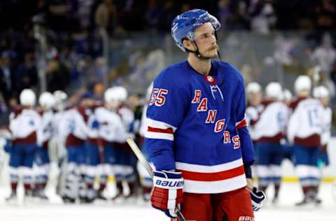 NEW YORK, NEW YORK – OCTOBER 25: Ryan Lindgren #55 of the New York Rangers reacts as the Colorado Avalanche celebrates by winning in a shootout at Madison Square Garden on October 25, 2022, in New York City. The Avalanche won 3-2. (Photo by Sarah Stier/Getty Images)