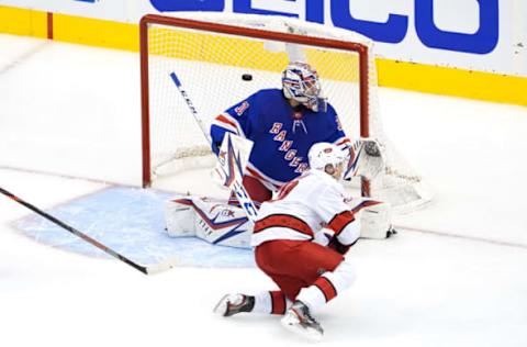 TORONTO, ONTARIO – AUGUST 04: Sebastian Aho #20 of the Carolina Hurricanes scores a goal on Igor Shesterkin #31 of the New York Rangers during the third period in Game Three of the Eastern Conference Qualification Round prior to the 2020 NHL Stanley Cup Playoffs at Scotiabank Arena on August 04, 2020, in Toronto, Ontario, Canada. (Photo by Andre Ringuette/Freestyle Photo/Getty Images)