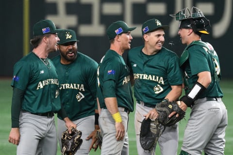 Members of the Australian team celebrate their 8-7 victory in the World Baseball Classic (WBC) Pool B round game between Australia and South Korea at the Tokyo Dome in Tokyo on March 9, 2023.  (Photo by RICHARD A. BROOKS/AFP via Getty Images)