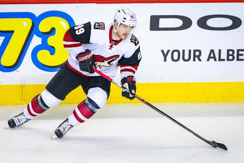 Jan 7, 2016; Calgary, Alberta, CAN; Arizona Coyotes left wing Mikkel Boedker (89) controls the puck against the Calgary Flames during the first period at Scotiabank Saddledome. Arizona Coyotes won 2-1. Mandatory Credit: Sergei Belski-USA TODAY Sports