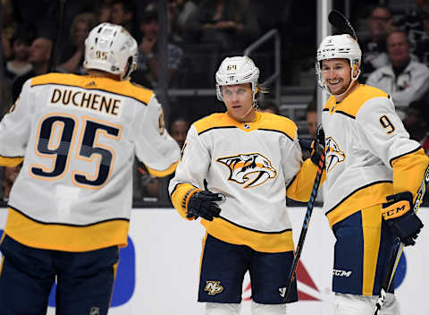 LOS ANGELES, CALIFORNIA – OCTOBER 12: Mikael Granlund #64 of the Nashville Predators celebrates his goal with Filip Forsberg #9 and Matt Duchene #95, to take a 1-0 lead over the Los Angeles Kings during the first period at Staples Center on October 12, 2019 in Los Angeles, California. (Photo by Harry How/Getty Images)