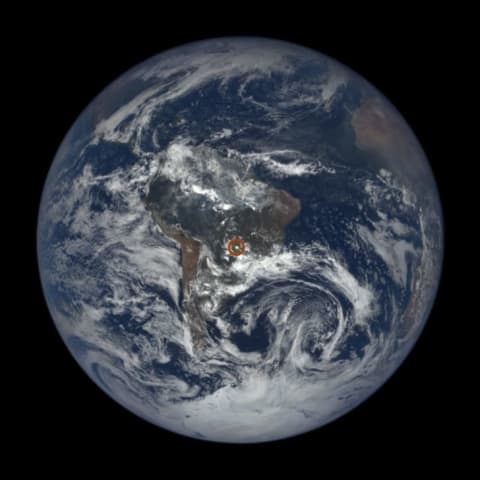 An image from the EPIC instrument aboard DSCOVR, taken on Dec. 3, 2015, shows a glint over central South America (circled in red).