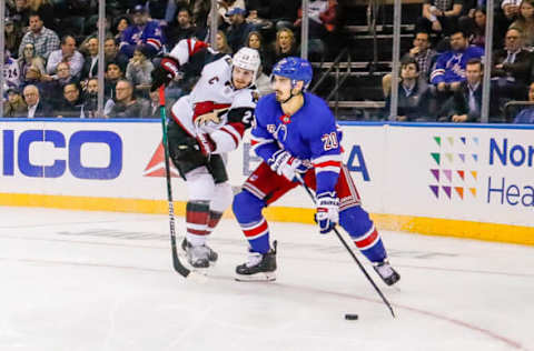 NEW YORK, NY – OCTOBER 22: New York Rangers center Chris Kreider (20) looks to pass as Arizona Coyotes defenseman Oliver Ekman-Larsson (23) defends during the Arizona Coyotes and New York Rangers NHL game on October 22, 2019, at Madison Square Garden in New York, NY. (Photo by John Crouch/Icon Sportswire via Getty Images)