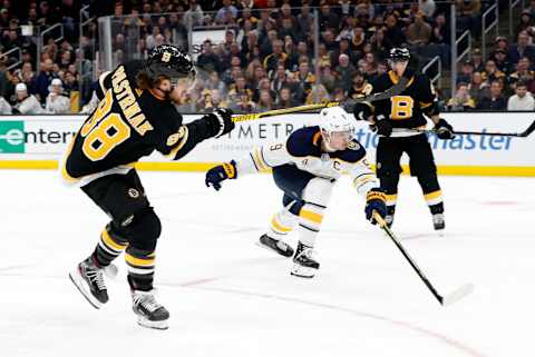 BOSTON, MA – DECEMBER 29: Boston Bruins right wing David Pastrnak (88) watches his shot go in for Bostons first goal during a game between the Boston Bruins and the Buffalo Sabres on December 29, 2019, at TD Garden in Boston, Massachusetts. (Photo by Fred Kfoury III/Icon Sportswire via Getty Images)