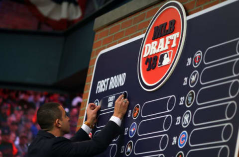 SECAUCUS, NJ – JUNE : 2018 first overall draft pick Casey Mize’s nameplate is added to the draft board during the 2018 Major League Baseball Draft at Studio 42 at the MLB Network on Monday, June 4, 2018 in Secaucus, New Jersey. (Photo by Alex Trautwig/MLB Photos via Getty Images)