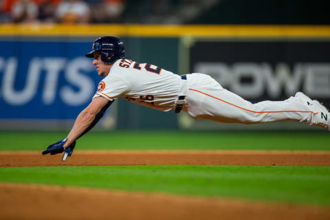 HOUSTON, TX – OCTOBER 06: Houston Astros center fielder Myles Straw (26) dives stealing second base in the eighth inning during the ALDS baseball game between the Houston Astros and the Cleveland Indians at Minute Maid Park, Saturday, October 6, 2018 at Houston. Houston Astros defeated Cleveland Indians 3-1. (Photo by Juan DeLeon/Icon Sportswire via Getty Images)