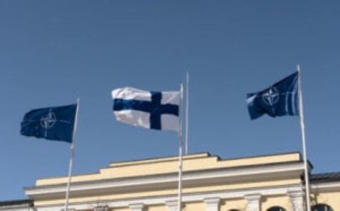 HELSINKI, FINLAND – APRIL 04: A view of a Finland flag (C) and two North Atlantic Treaty Organization (NATO) flags waving at the Finnish Foreign Ministry in Helsinki, Finland on April 04, 2023. Finland officially joined NATO on Tuesday (April 4) as Foreign Minister Pekka Haavisto handed the signed accession treaty to US Secretary of State Antony Blinken. (Photo by Jakob Johannsen/Anadolu Agency via Getty Images)