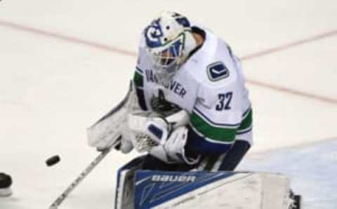 Mar 5, 2017; Anaheim, CA, USA; Vancouver Canucks goalie Richard Bachman (32) makes a save in the third period of the game against the Anaheim Ducks at Honda Center. Canucks won 2-1. Mandatory Credit: Jayne Kamin-Oncea-USA TODAY Sports