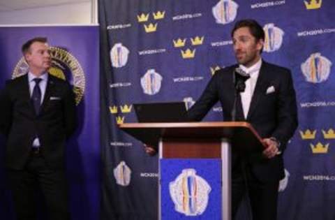 Mar 2, 2016; Tarrytown, NY, USA; New York Rangers goalie Henrik Lundqvist speaks during a press conference for the upcoming 2016 World Cup of Hockey at MSG Training Center. Sweden head coach Rikard Gronborg looks on. Mandatory Credit: Adam Hunger-USA TODAY Sports