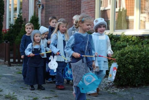 Kids dress up in costume.