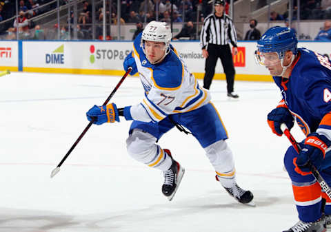 ELMONT, NEW YORK – DECEMBER 30: JJ Peterka #77 of the Buffalo Sabres skates against the New York Islanders at the UBS Arena on December 30, 2021 in Elmont, New York. (Photo by Bruce Bennett/Getty Images)