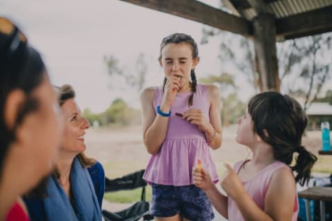 girl makes sour face