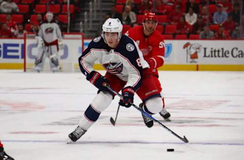 DETROIT, MI – OCTOBER 04: Zach Werenski #8 of the Columbus Blue Jackets skates with the puck while playing the Detroit Red Wings at Little Caesars Arena on October 4, 2018 in Detroit, Michigan. (Photo by Gregory Shamus/Getty Images)