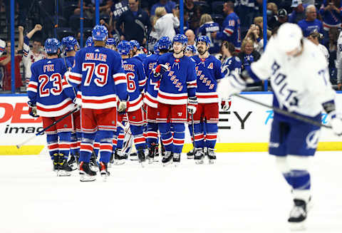 New York Rangers teammates celebrate as they beat the Tampa Bay Lightning at Amalie Arena. Credit: Kim Klement-USA TODAY Sports