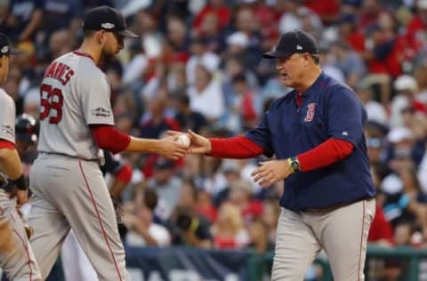 Oct 7, 2016; Cleveland, OH, USA; Boston Red Sox manager John Farrell (right) takes the ball from relief pitcher Matt Barnes (68) against the Cleveland Indians in the sixth inning during game two of the 2016 ALDS playoff baseball series at Progressive Field. Mandatory Credit: Rick Osentoski-USA TODAY Sports